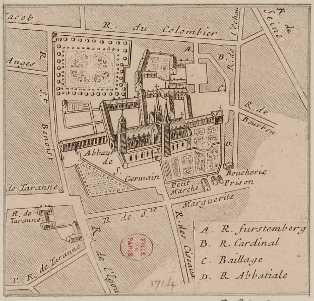 Eine alte Stadtkarte mit einem zentralen Gebäude und beschreibendem Text auf dem Papier.