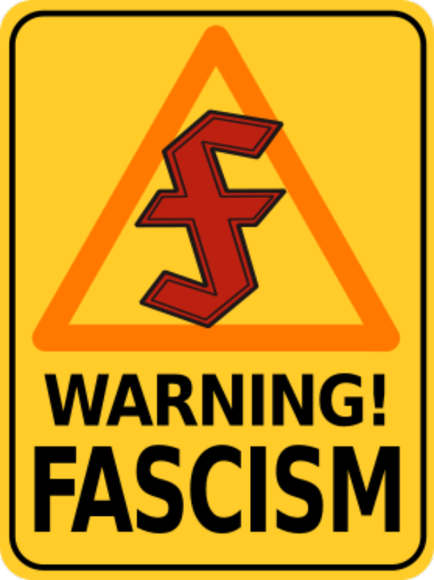 Ein gelbes Warnschild mit " Warnung Faschismus " in fetten schwarzen Buchstaben und einem Blitzsymbol.