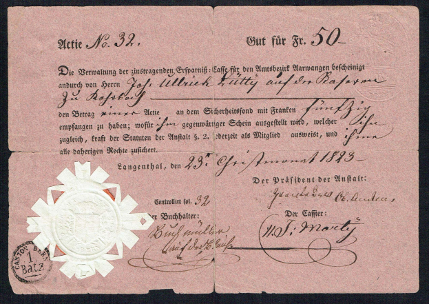 Ein altes deutsches Geldschein mit einem Siegel, das den Nennwert angibt, vor einem schwarzen Hintergrund.