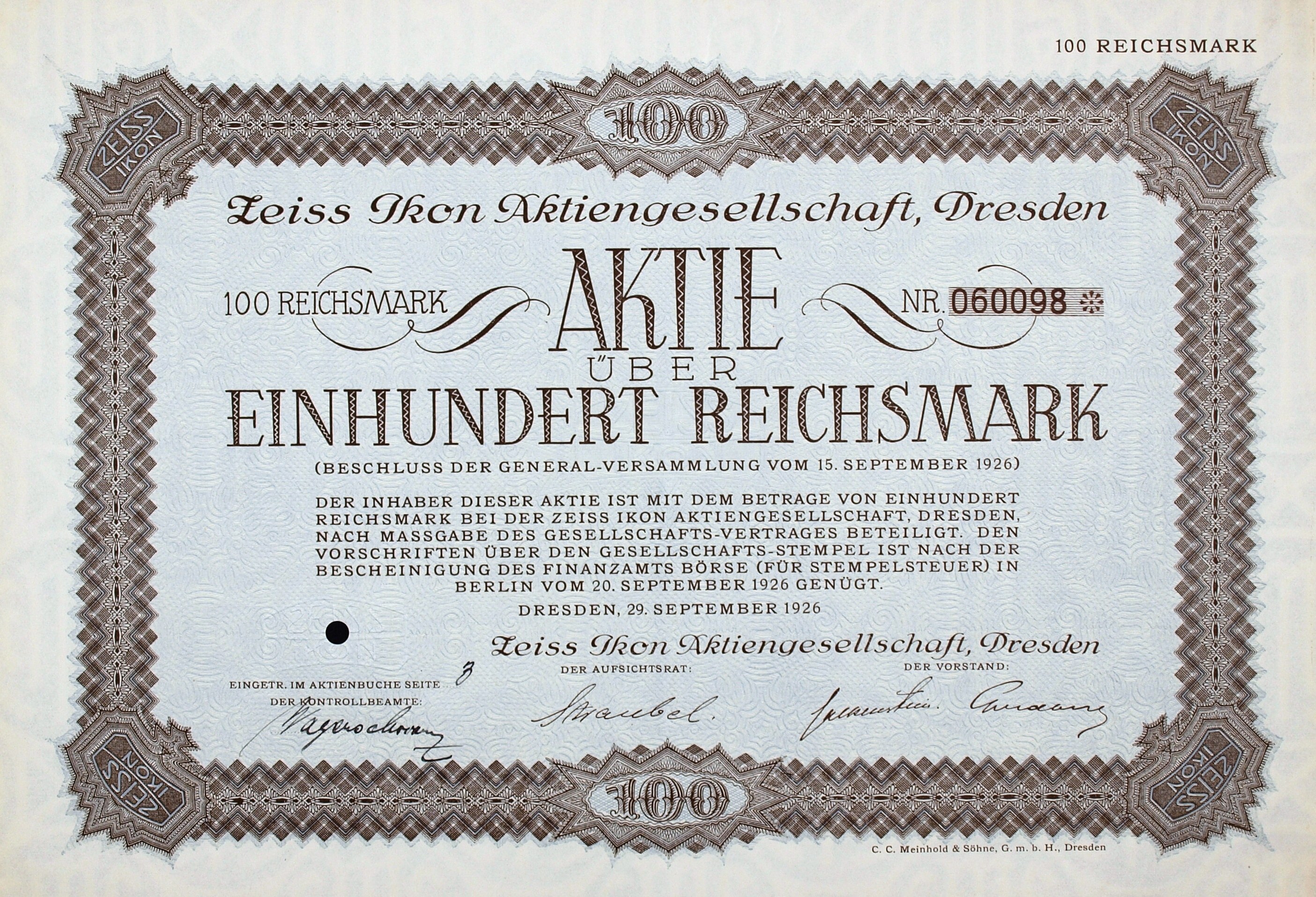 Alte deutsche Aktie über 100 Reichmark mit schwarzem Rand und deutscher Beschriftung.