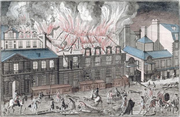 Ein Bild einer Stadtstraße mit einem Feuer in der Mitte, umgeben von Gebäuden, Menschen, Pferden, Wagen und anderen Gegenständen, mit Text unten.